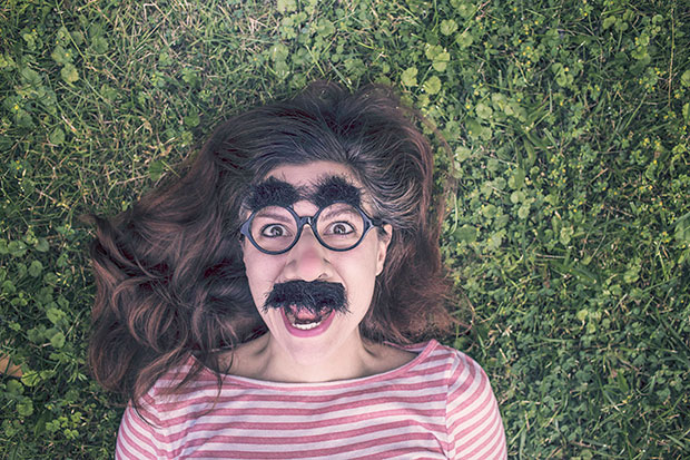 Girl in funny mask - stress relief tips list